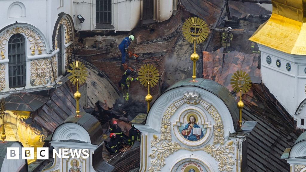 Russian strikes kill 11 and set historic cathedral in Kyiv ablaze