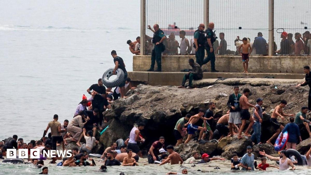 Spain sending troops as thousands enter enclave of Ceuta from Morocco