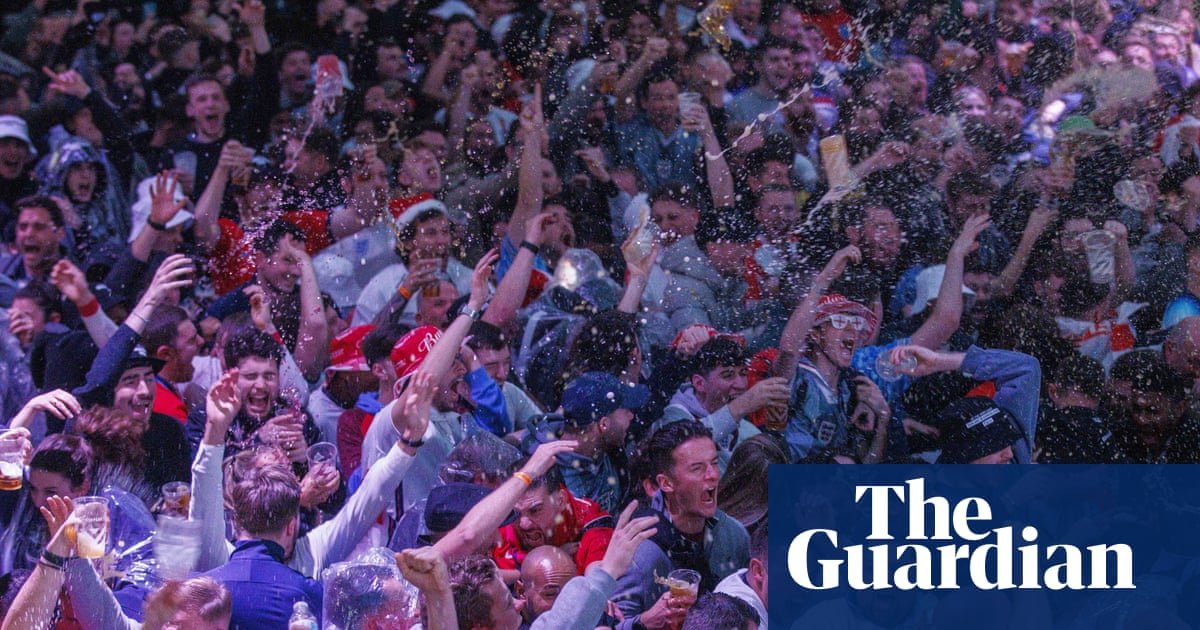 ‘Drenched by beer’: England fans go wild for the World Cup pint-toss celebration