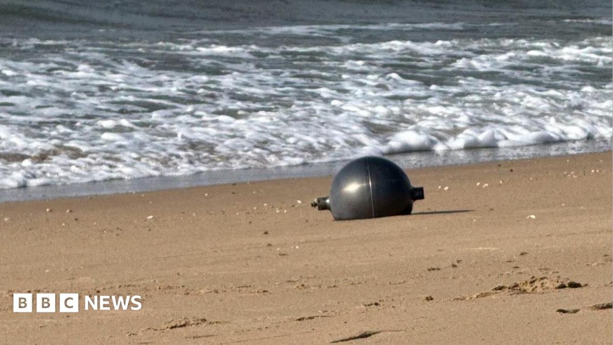 Australia probes mystery space balls that washed up on beach