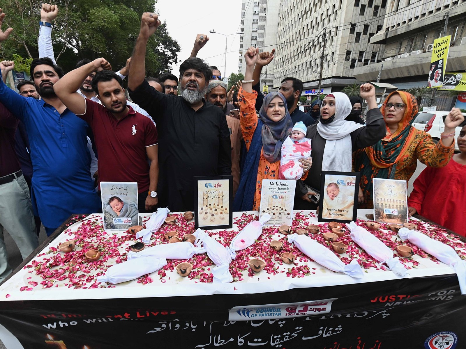 Pakistan suspends eight officials over hospital fire that killed 14 babies