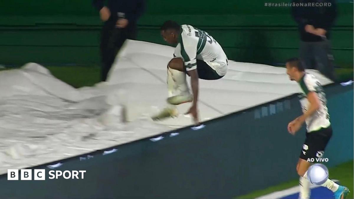 Brazilian player falls down tunnel during goal celebration