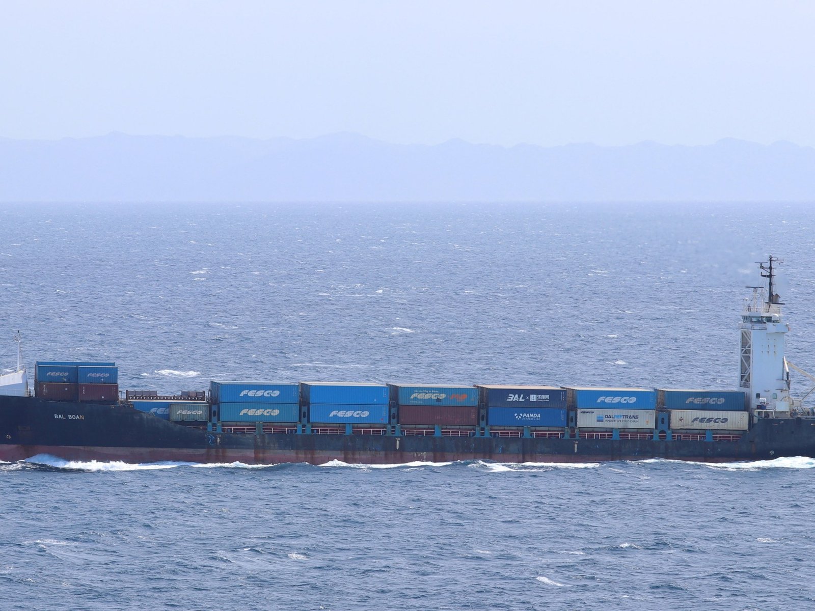 US military fires on cargo vessel it said sought to break Iran blockade
