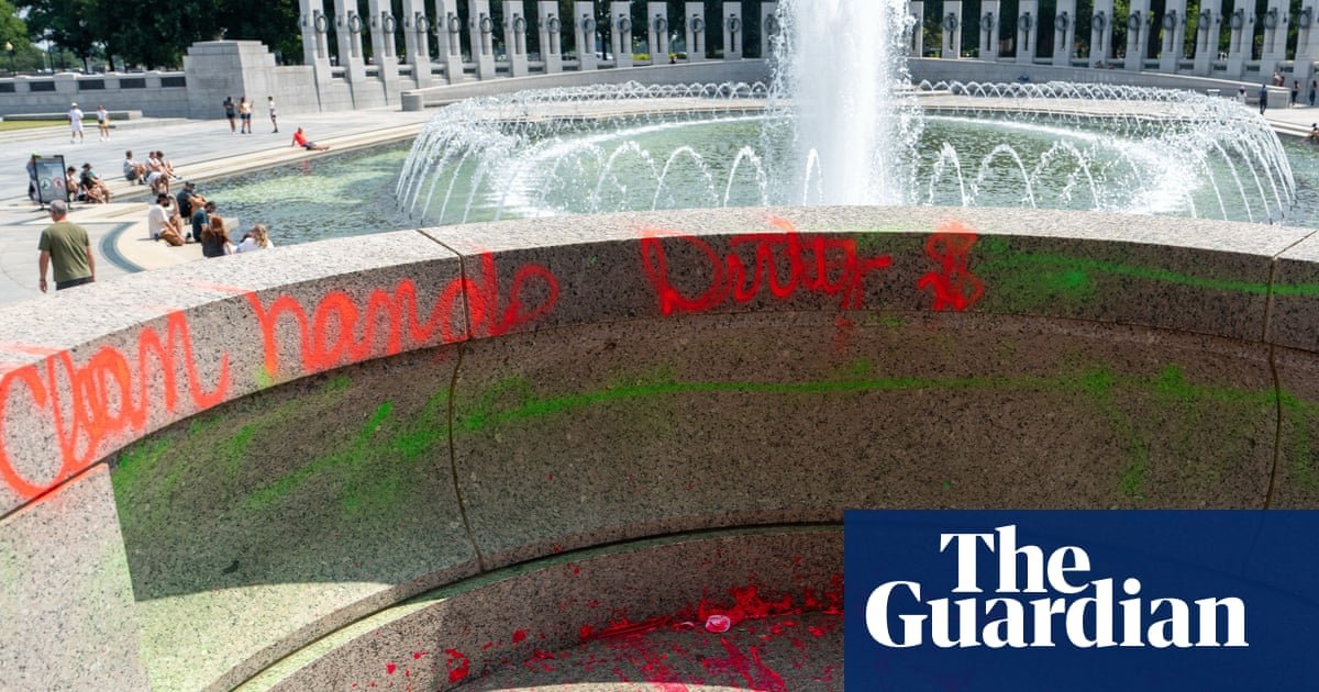 Woman arrested in connection with vandalism at second world war memorial in DC