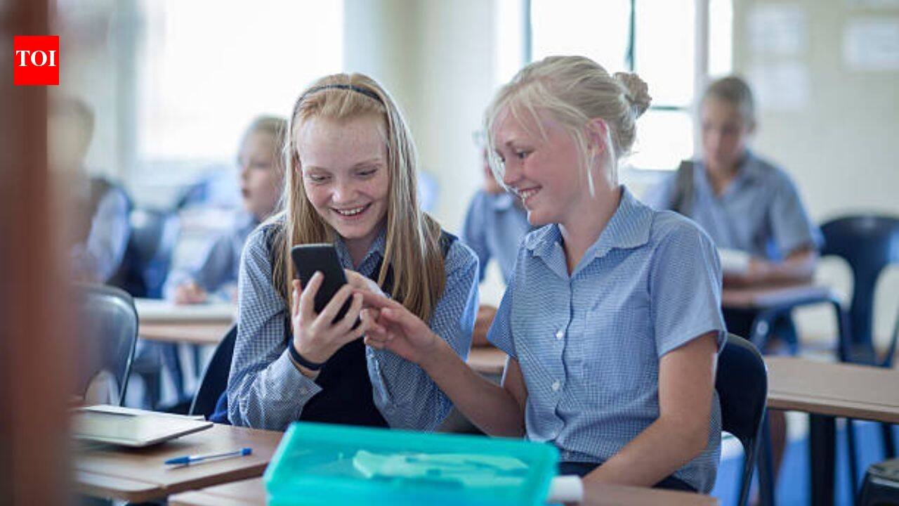 A new Kansas law bars students from accessing phones, earbuds and smartwatches all school day, while one parent group is pushing for tighter iPad limits
