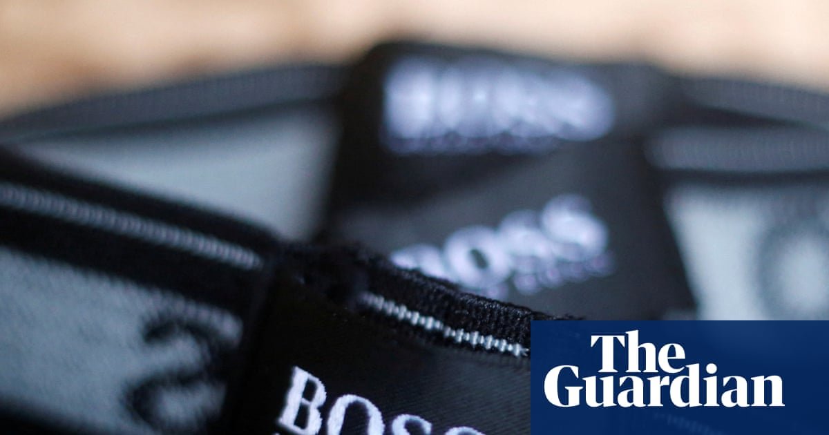 Sports Direct owner Mike Ashley tightens hold on Hugo Boss