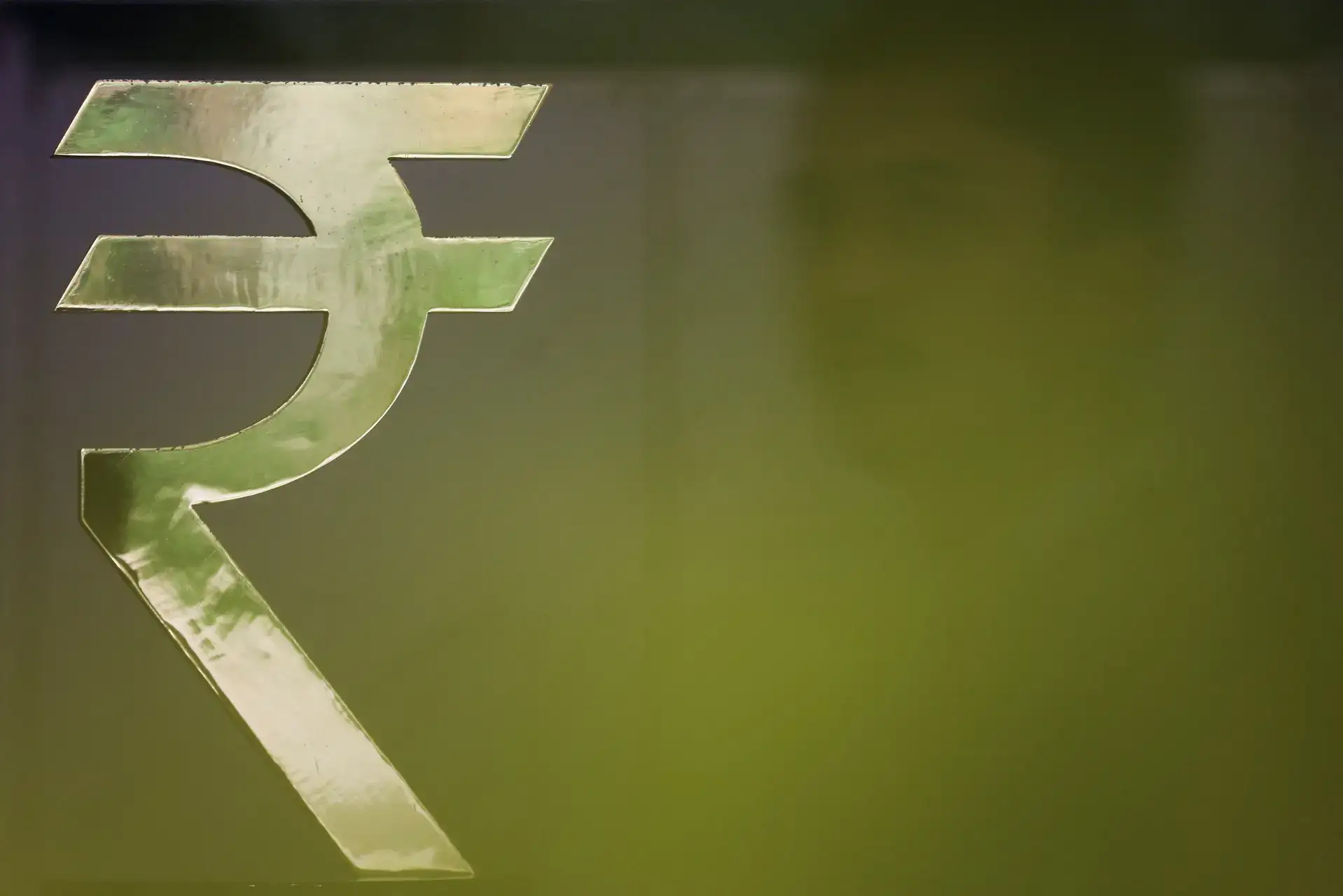 Rupee nudges up on RBI intervention; investors eye inflation data