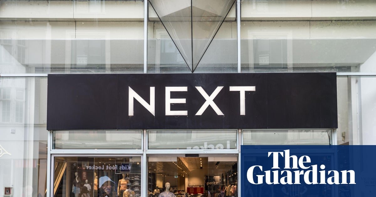 Next forecasts bigger profits after hot weather lifts sales