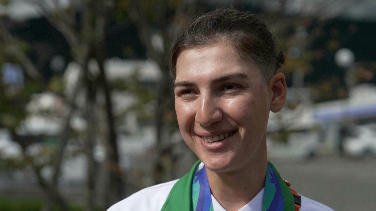 Afghan female cyclist wins silver at Asian Games after disguising herself as a man to train