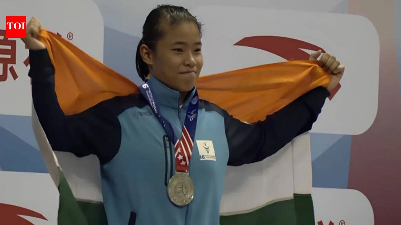 Roshibina Devi assures medal after second chance, one win away from Asian Games final