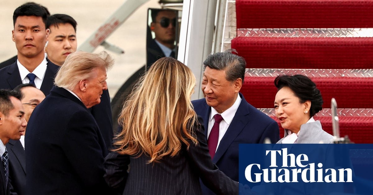 Trump greets Xi Jinping on arrival in rare move as US-China trade truce extended