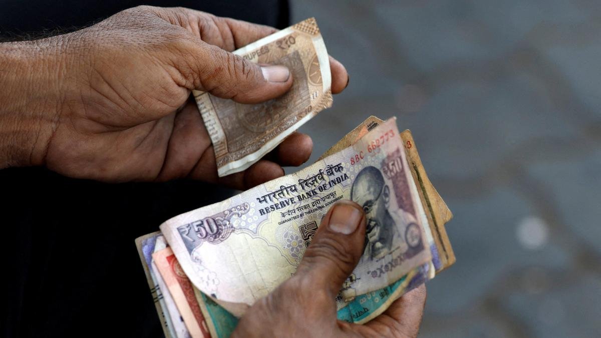 Rupee rises 14 paise to close at 94.59 against U.S. dollar