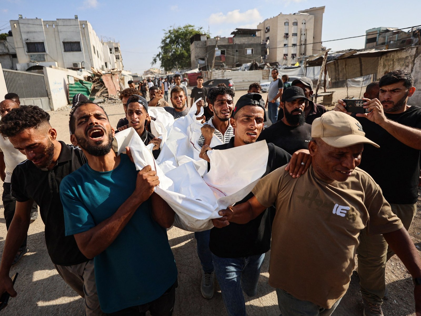 Seven killed in Gaza as Israel targets university campus and other sites