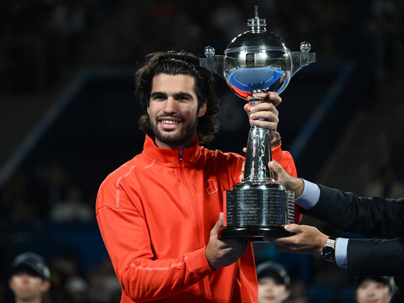 Djokovic wins China Open after de Minaur retires, Alcaraz wins Japan Open