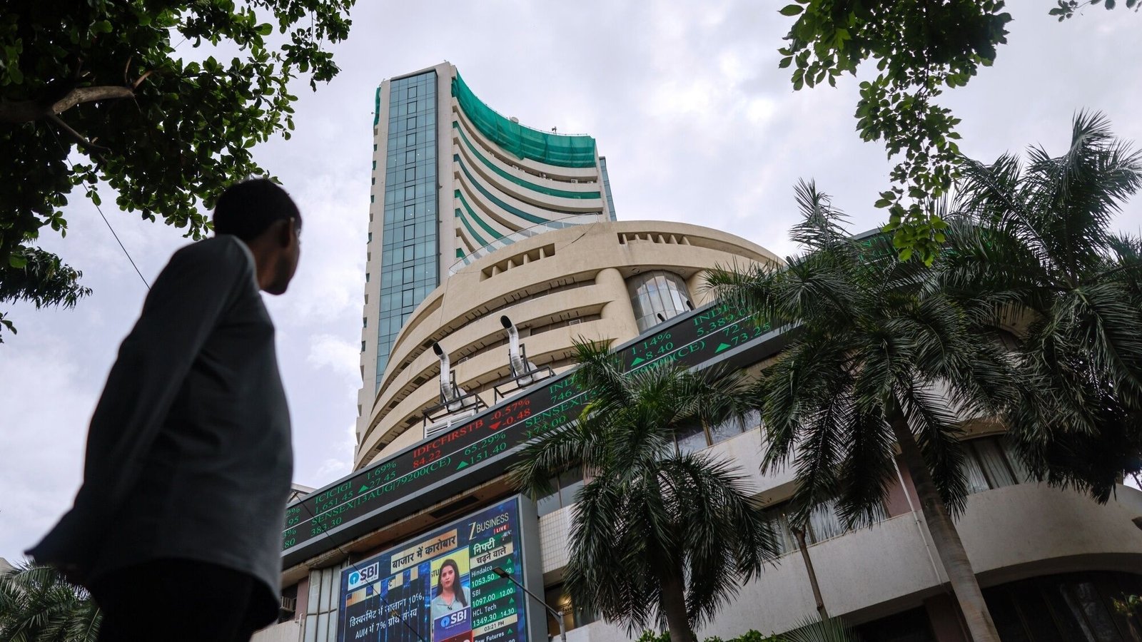 Sensex, Nifty open flat in green as investors track crude oil prices, US Fed policy decision