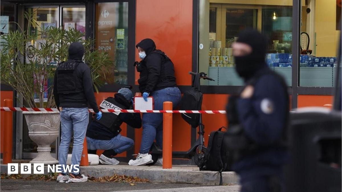 Deadly shooting near Paris is a 'racist terrorist attack', Macron says