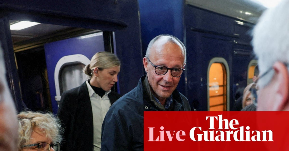 Friedrich Merz begins unannounced Kyiv visit as Russia continues strikes on Ukraine’s capital – Europe live